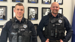 two officers in new bullet proof vests