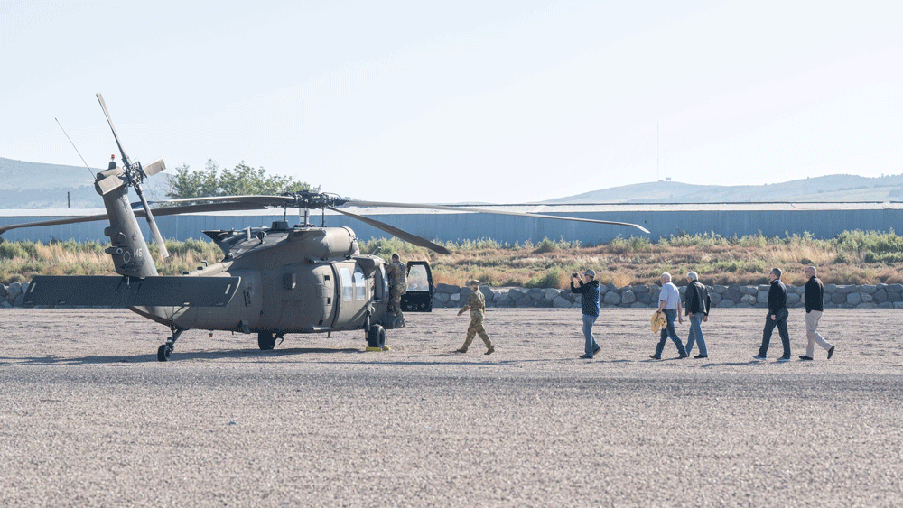 Melaleuca IT Director James Andersen steps aboard a Black Hawk helicopter that is part of the Idaho National Guard.