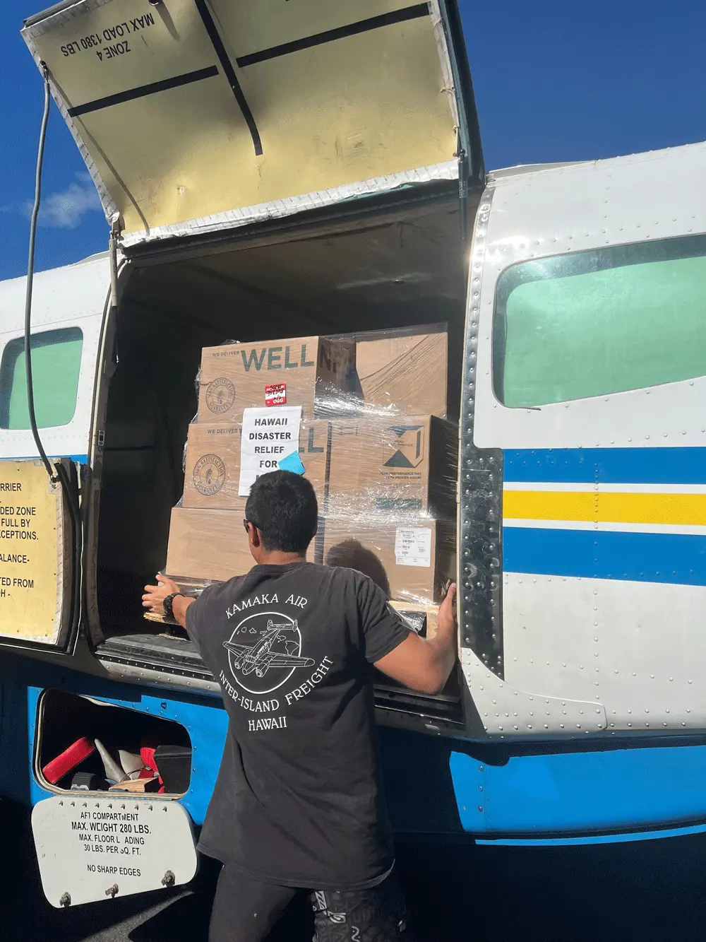 Melaleuca donated products being unloaded