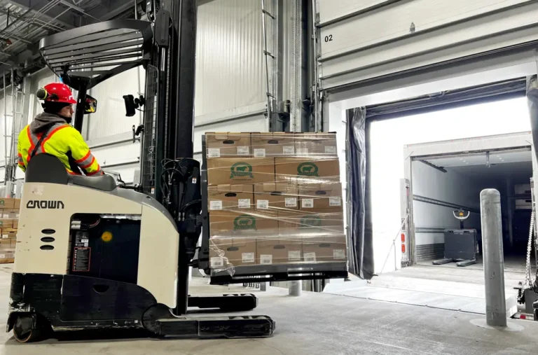 forklift driver unloads melaleuca beef donation from trailer
